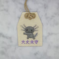 ウーパールーパー『大丈夫守』｜生きもの刺繍のお守り