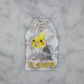 オカメインコ『大丈夫守』｜生きもの刺繍のお守り