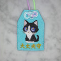 ハチワレネコ『大丈夫守』｜生きもの刺繍のお守り